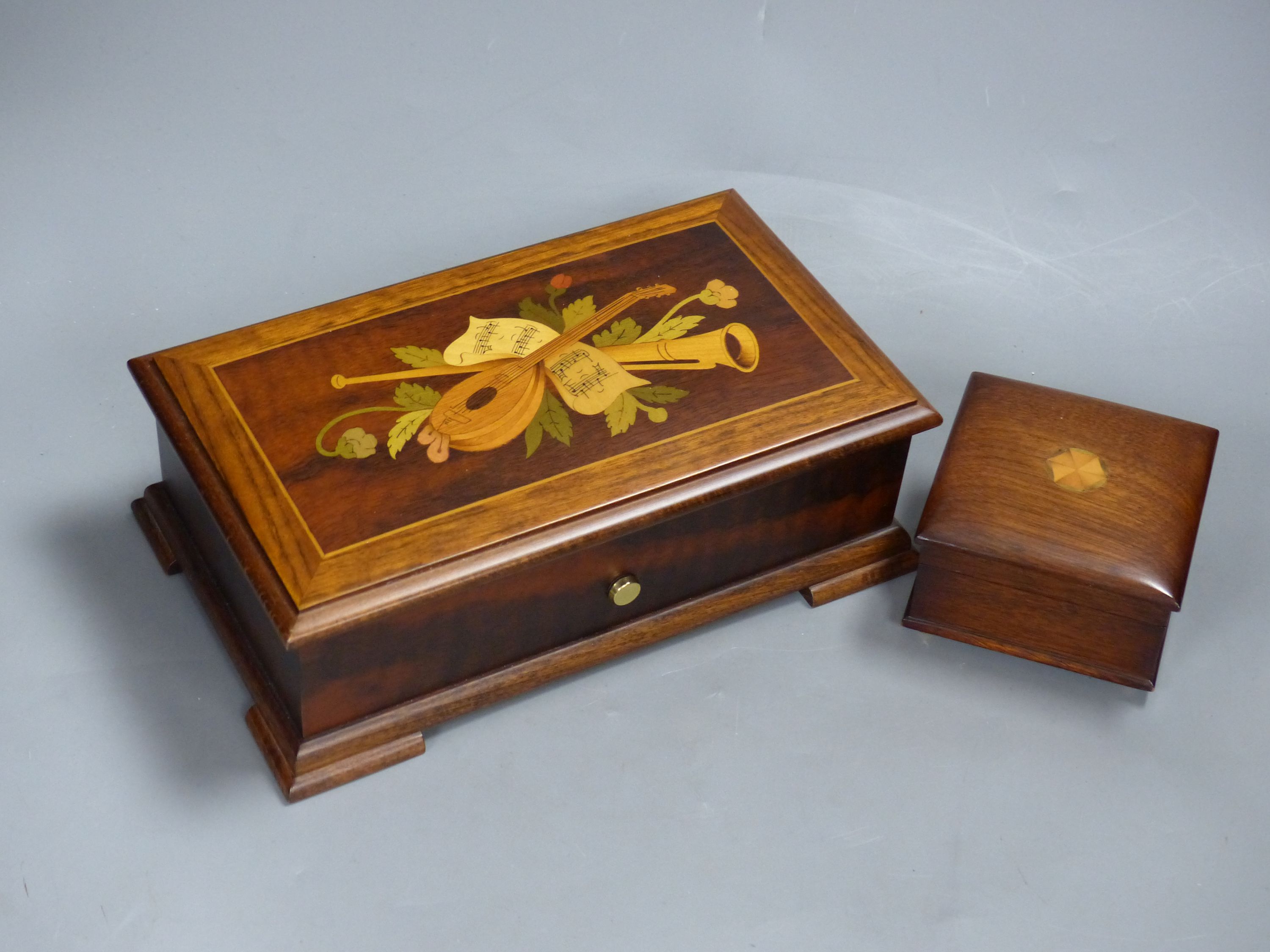 A Swiss Reuge St Croix marquetry and walnut cylinder music box, playing 'The Four Seasons' and a similar small square music box